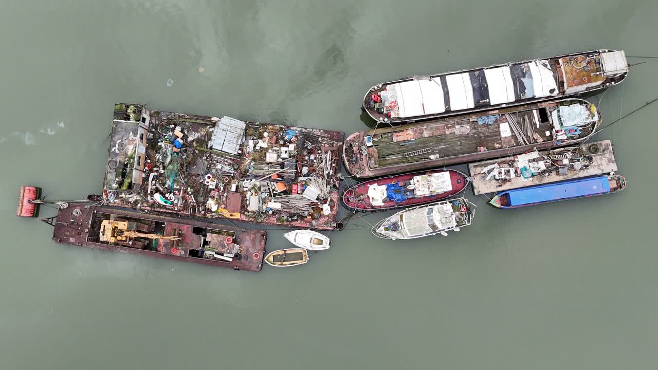 Waste barges on River Medway Kent uk Overhead birds eye drone aerial view