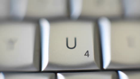 a u key quickly comes into focus