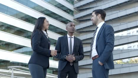 content business colleagues greeting each other