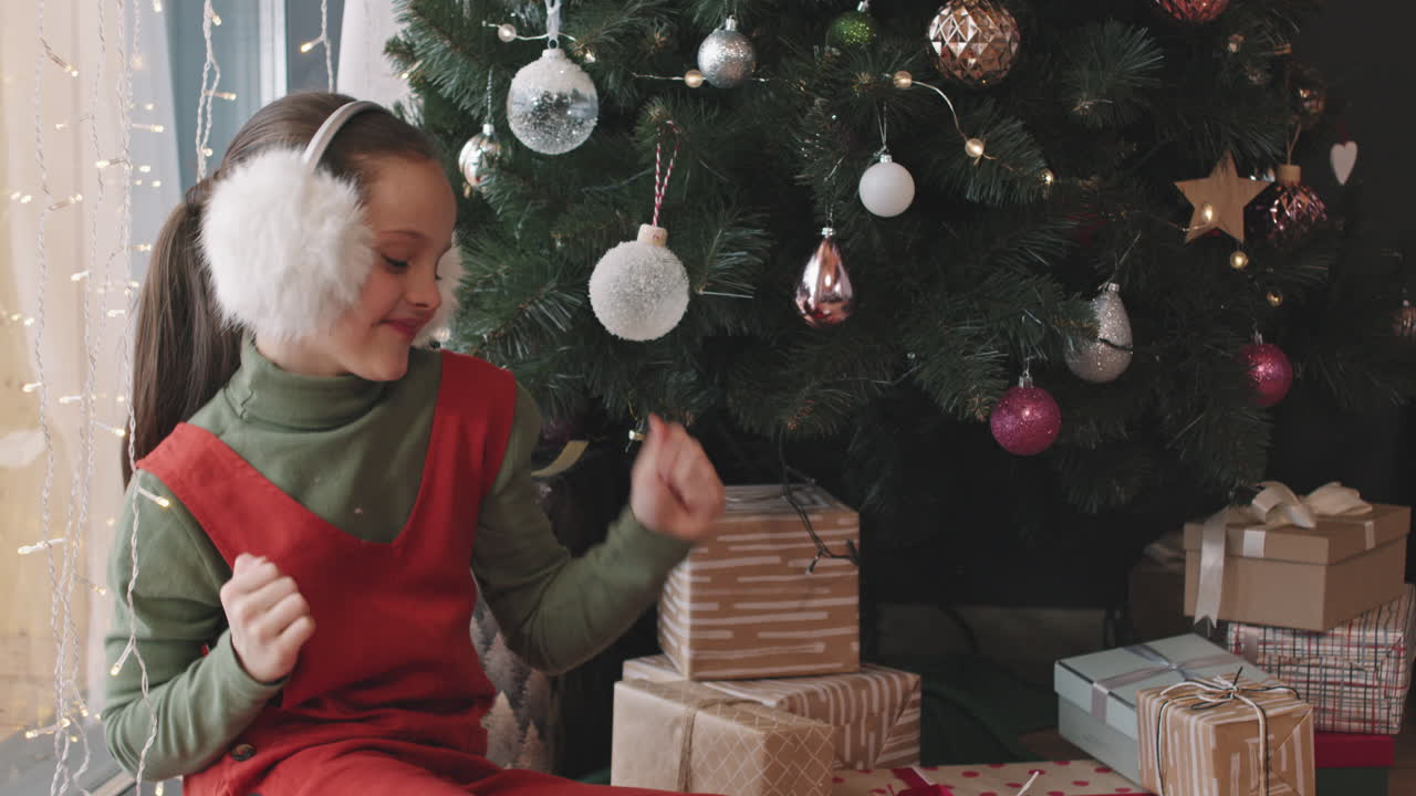Girl Unpacking Christmas Present Box