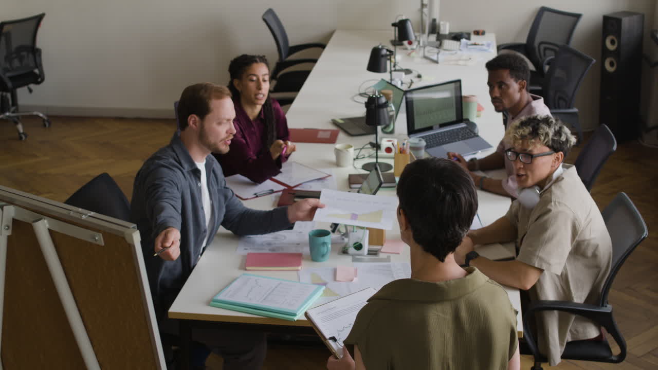 Diverse Group of Professionals Collaborating in an Office Meeting