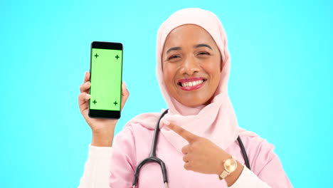 Green-screen,-phone-and-doctor-isolated-on-blue
