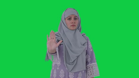 angry muslim woman asking to stop green screen