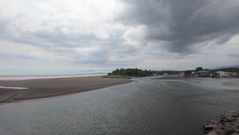 Pacific-Ocean-seafront-of-Quepos-with-the-local-sandy-beach-in-the-background-in-stormy-weather-in-Costa-Rica