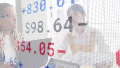 In office, animation overlaying financial data on laptops with professionals working