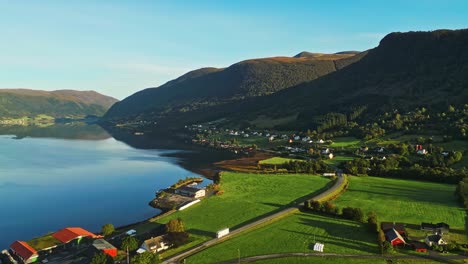 aerial over syvde on a lovely sunny day, vanylven municipality, norway