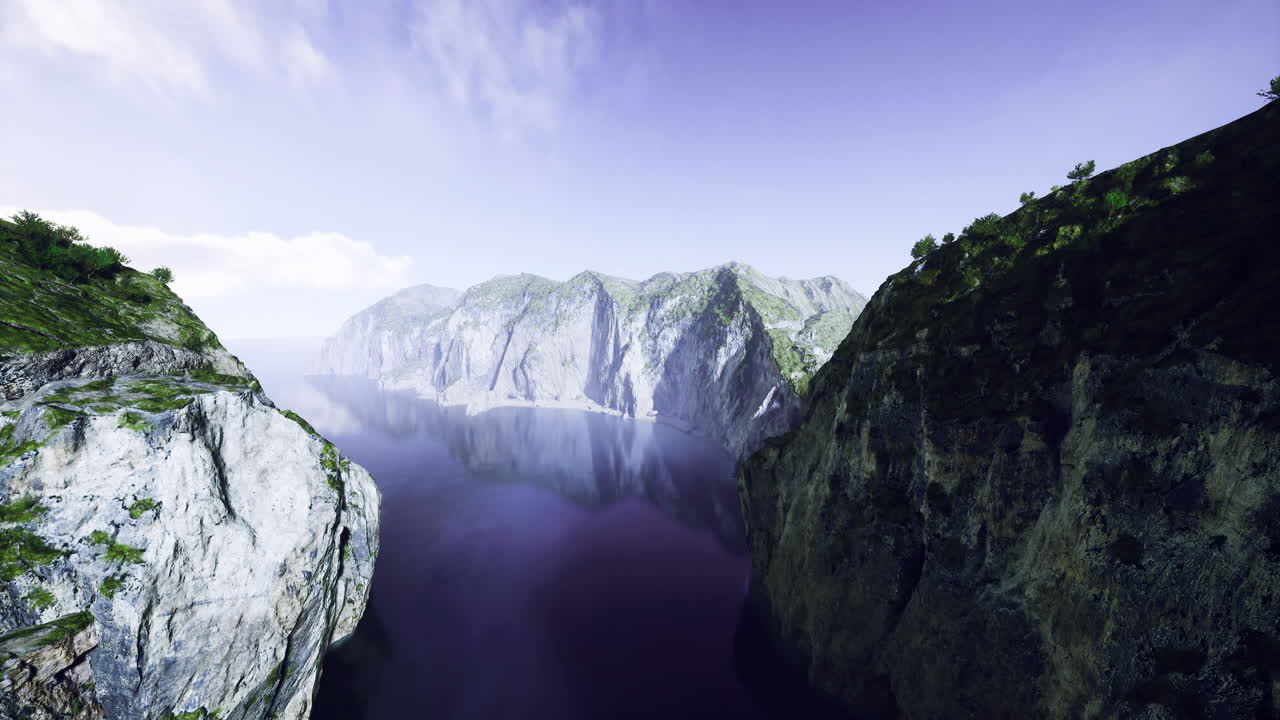 Breathtaking view of cliffs and tranquil waters at dawn in a serene landscape