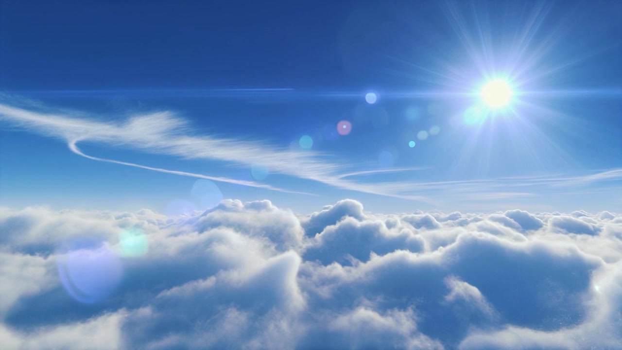 ふわふわの雲の上で明るい太陽が輝く空撮
