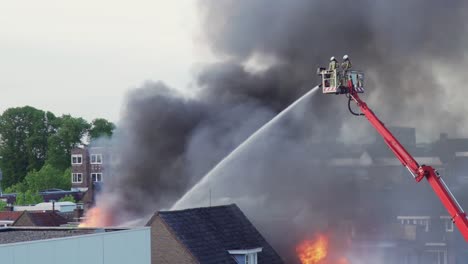 firefighters fighting a building fire