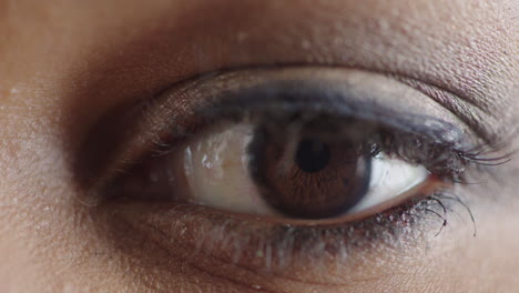 close up woman eye opening blinking looking around