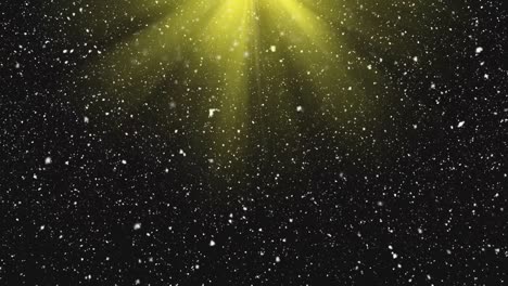 animation of christmas snow falling over pulsating yellow spotlight on black background