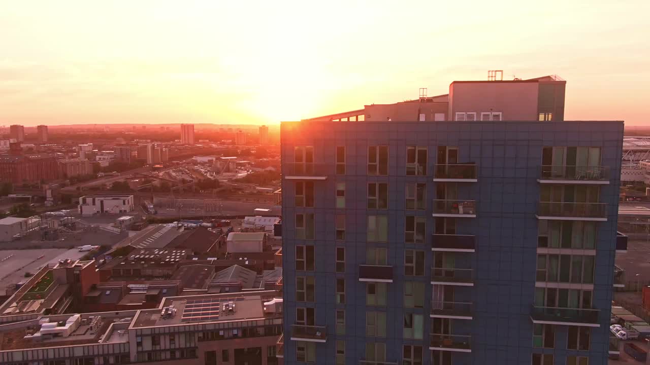 London sunset drone flying stratford stadium blue building descending