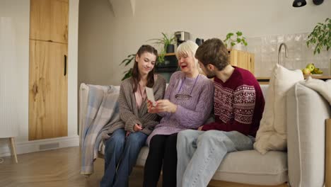 family looking at a photo