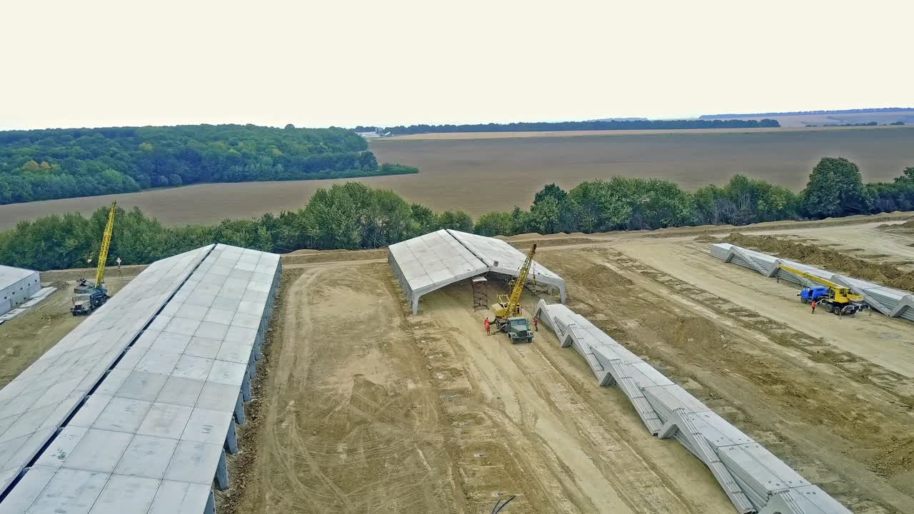Constructing new farm. Aerial view of farm under construction for livestock