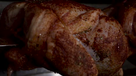 Close-up-shot-of-chicken-turning-on-rotisserie