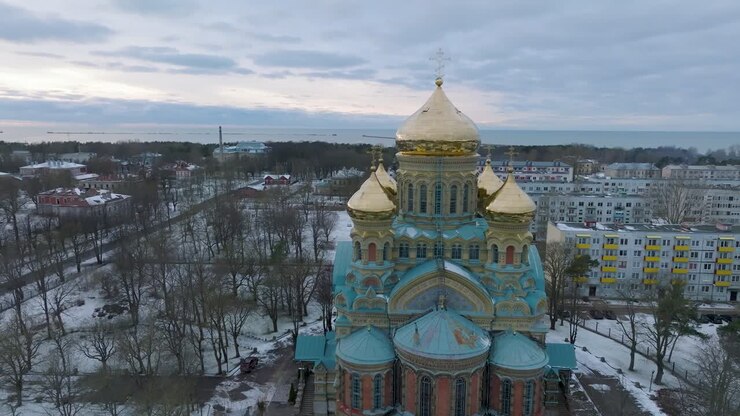 Aerial establishing view of orthodox , orbiting drone shot