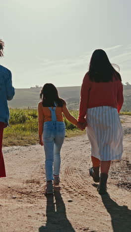 Road,-countryside-and-girls-walking-on-holiday