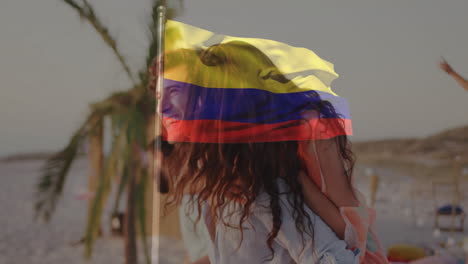 couple walking on beach with colombian flag animation overlaying scene