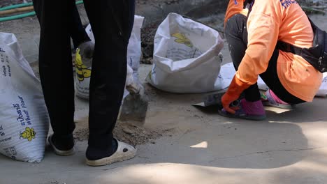 people working together to clean up a spill.