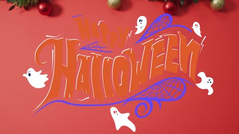 animation of happy halloween text over christmas decorations