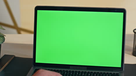 boss hand swiping touchpad on chromakey laptop starting lesson at home zoom on