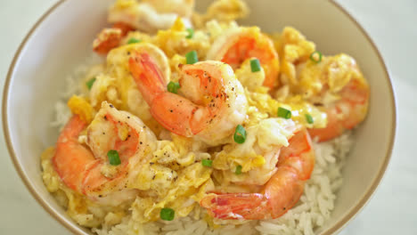 homemade creamy omelet with shrimps rice bowl