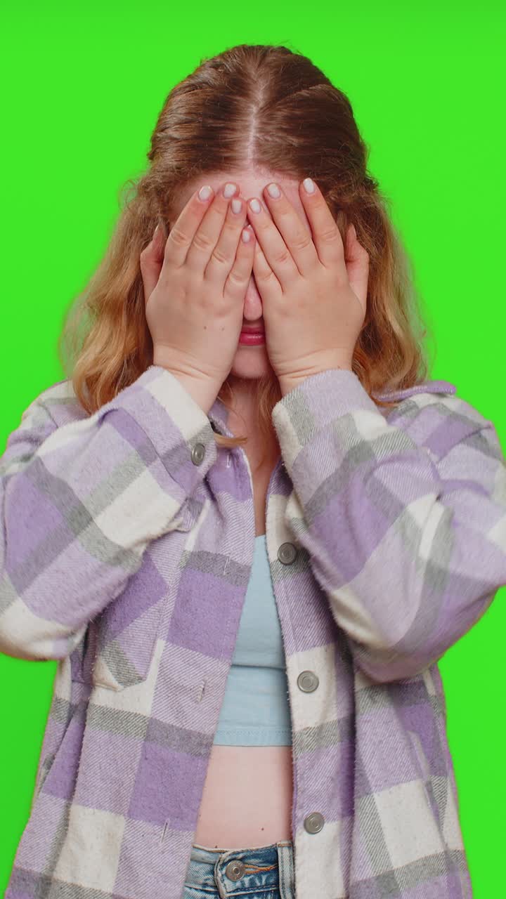 Afraid shocked young woman closing eyes confused shy scared reject to watch phobia shame stress