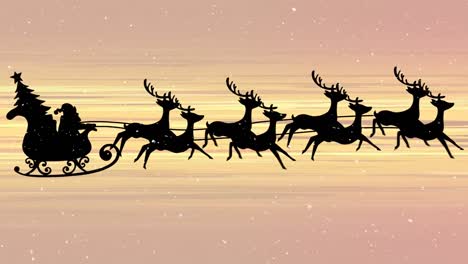 snow falling on santa claus in sleigh being pulled by reindeers against yellow light trails