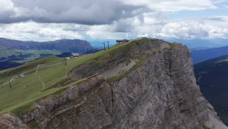 aerial towards chairlift  on seceda ridgeline, dolomites