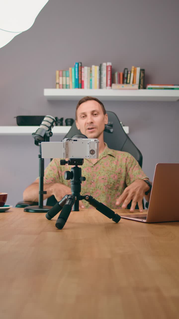 Man Recording a Video at Home