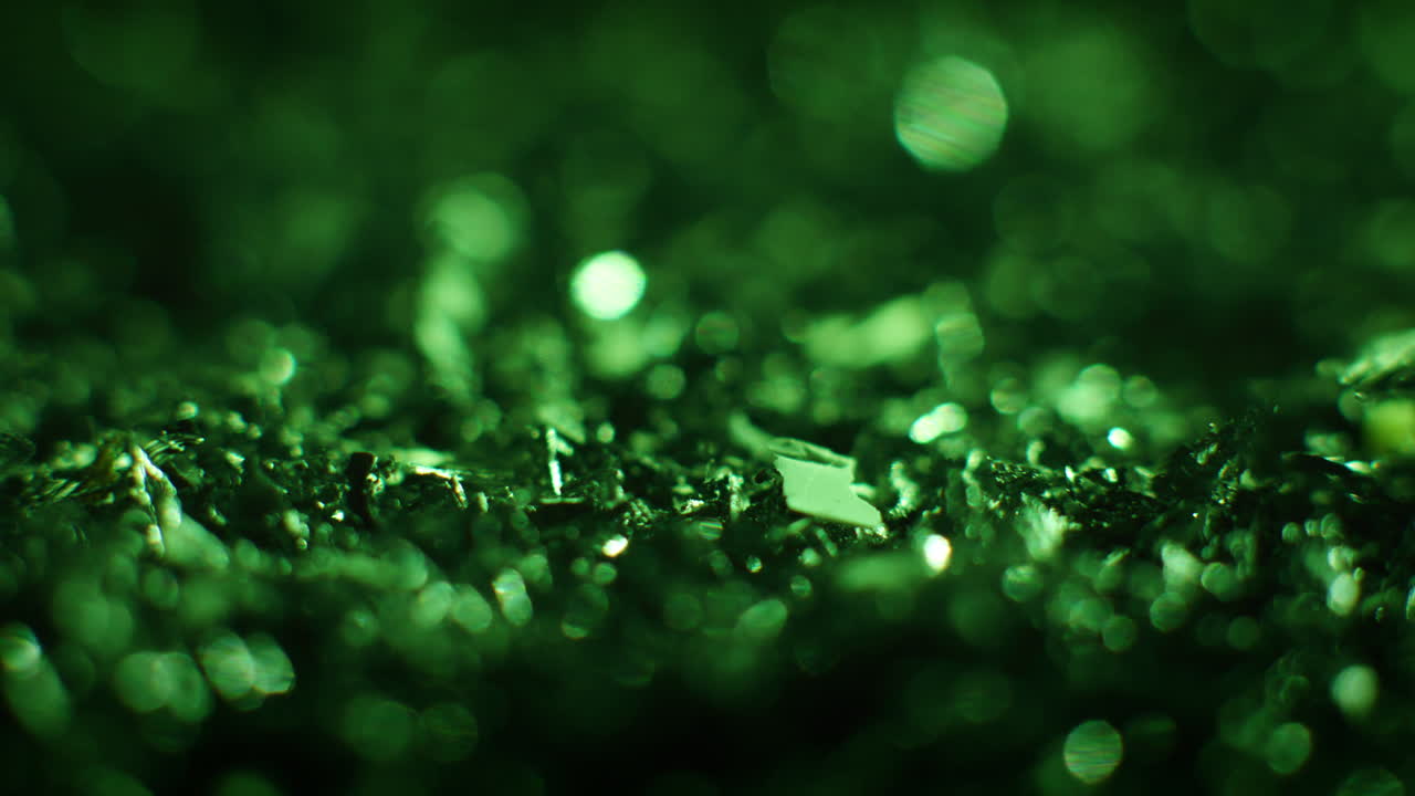 Emerald color metal fillings close-up shot