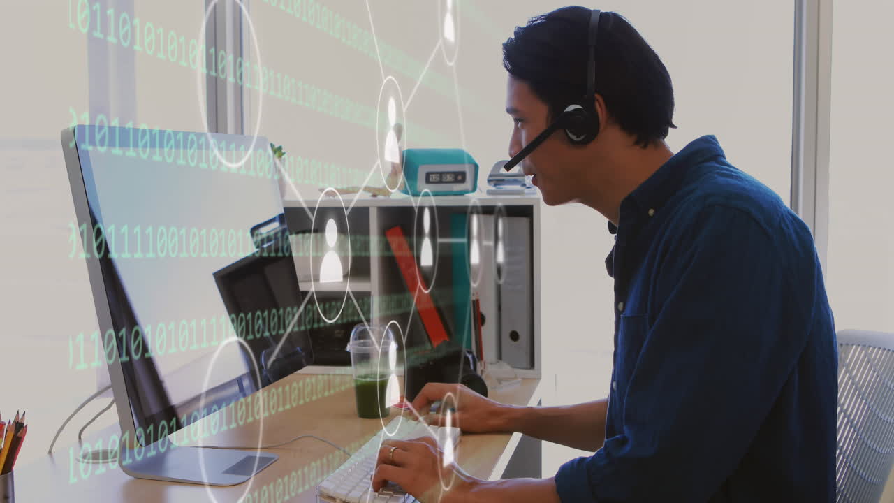 Animation of icons and data processing over caucasian businessman using computer in office