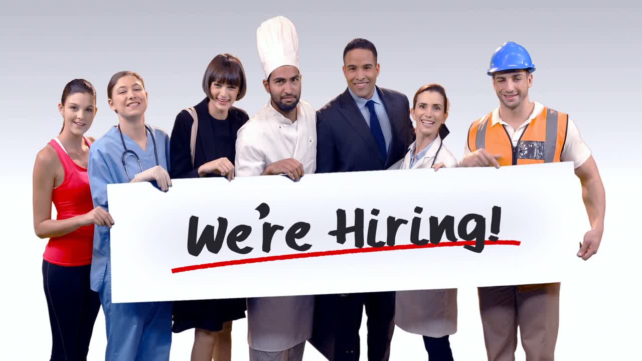 Various professional holding placard of were hiring text
