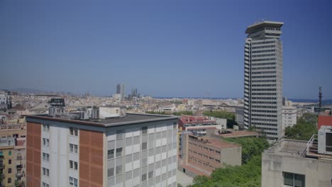 city center view, overview of barcelona spain in the early morning as birds fly along city skyline in 6k