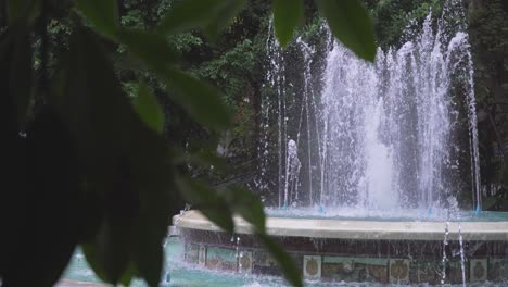 marbella fountain in green public park, no people, costa del sol vacation footage, malaga, spain