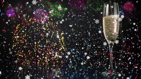 Animation-of-fireworks-and-glass-of-champagne-on-black-background