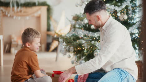 son gives father a christmas present