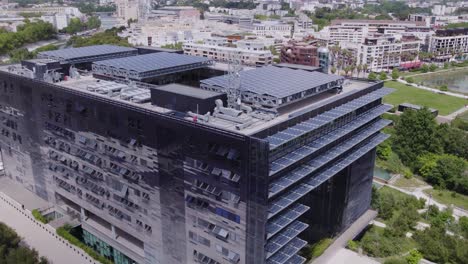 Aerial-View-of-Port-Marianne-with-Rotating-Shot-of-Montpellier-City-Hall-with-sun