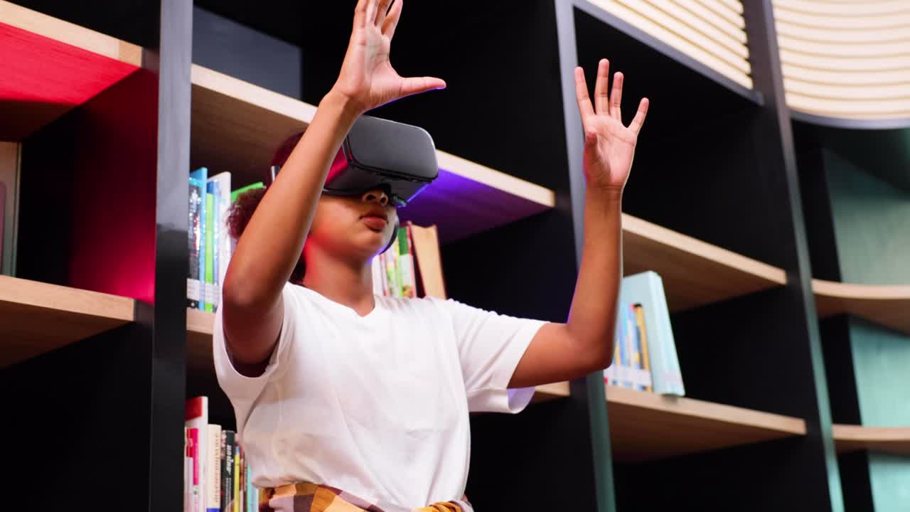 VR headset library. Young teen girl student training and learning with VR virtual teality headset in school library.