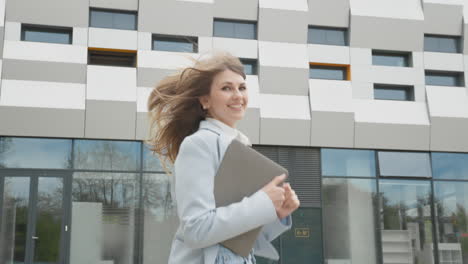 caucasian female office worker rushing on her business with folders pretty woman business worker job