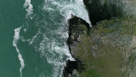 Top-down-aerial-over-unusual-shaped-harsh-coastline