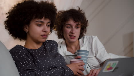 couple watching movie on laptop