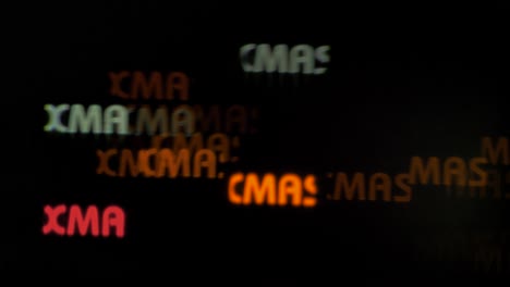 beautiful xmas text shaped bokeh from moving car and traffic lights at the evening, christmas, winter or holiday background concept, copyspace