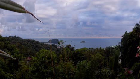 Time-lapse-of-clouds-passing-by-over-the-lush-and-densely-overgrown-pacific-coast-of-central-America