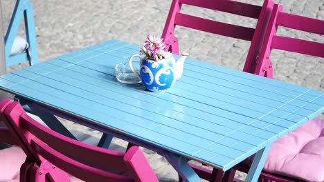 colorful outdoor cafe table and chairs