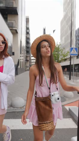 two young women traveling in the city