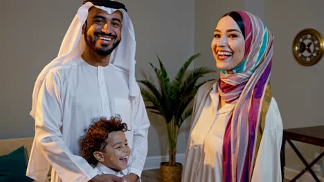 happy muslim family at home