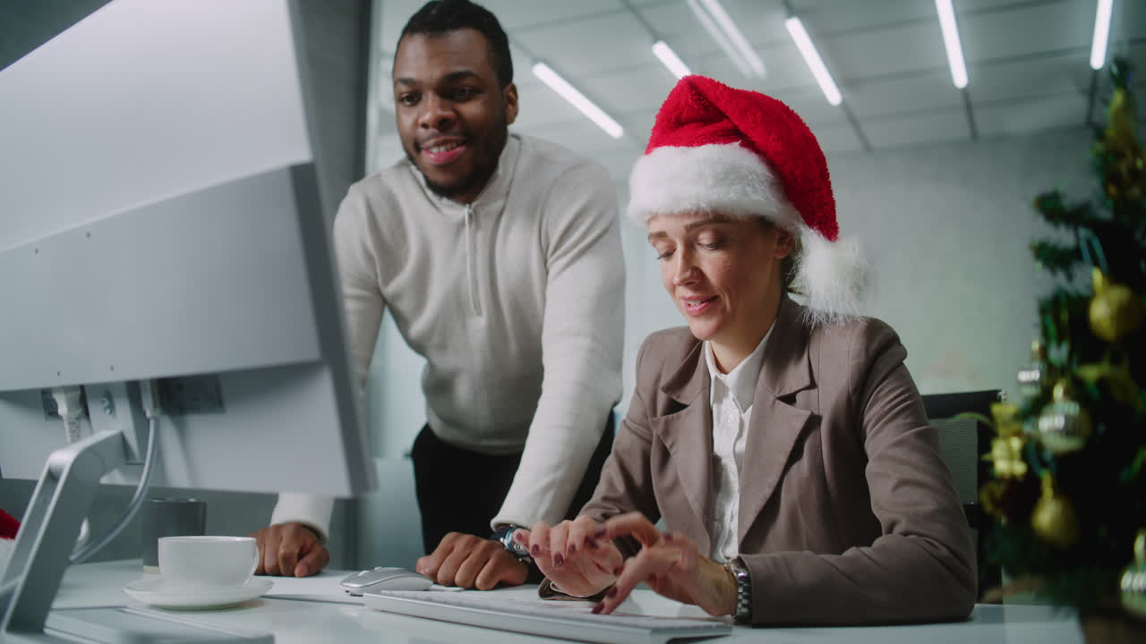 Office Workers Collaborating During Christmas Season