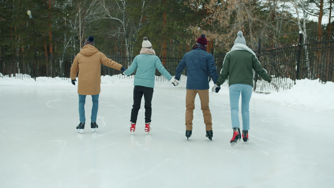 Friends Ice Skating in Winter