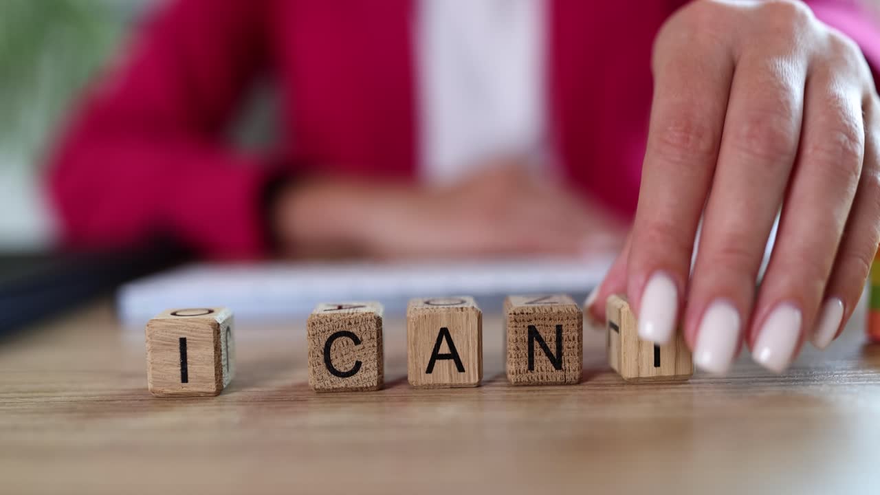 Inspirational message with wooden blocks spelling I can
